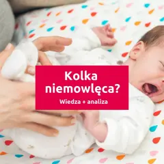 Płacz niemowlaka może oznaczać kolkę jelitową. Rodzic próbuje ukoić dziecko.