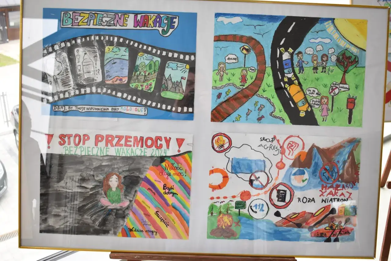 Prace z konkursów dla dzieci o bezpiecznych wakacjach: filmowa taśma z wakacyjnymi scenkami, droga z autami, stop przemocy i mapa zagrożeń.